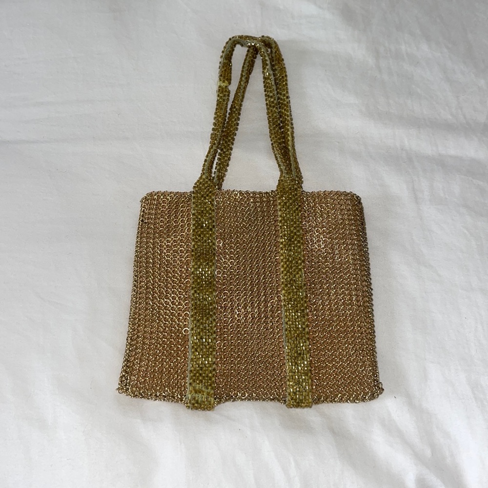 Nancy Bacich mini gold hand bag